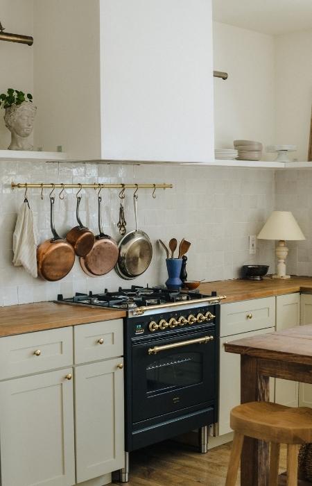 Off white L-shape kitchen design with wooden interiors - Beautiful Homes