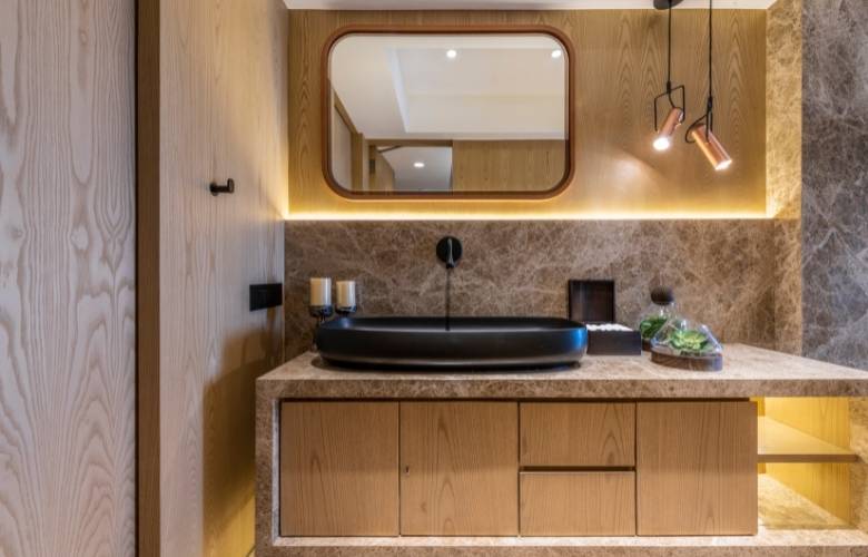 Bathroom vanity with marble wash basin countertop & wall tiles - Beautiful Homes