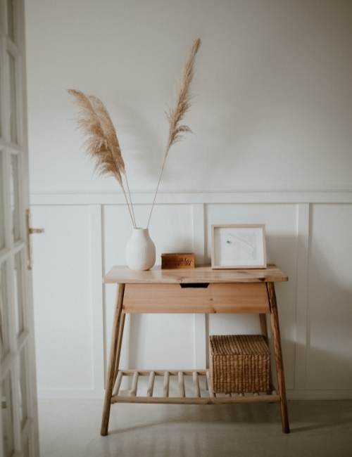 Wooden console table at the entryway with storage space - Beautiful Homes