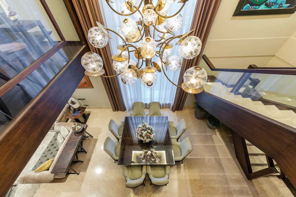 Light design around the stairs for duplex room with mirrors on the walls  - Beautiful Homes