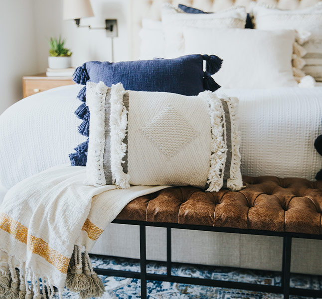 Blue & white cushion cover for bedroom design - Beautiful Homes