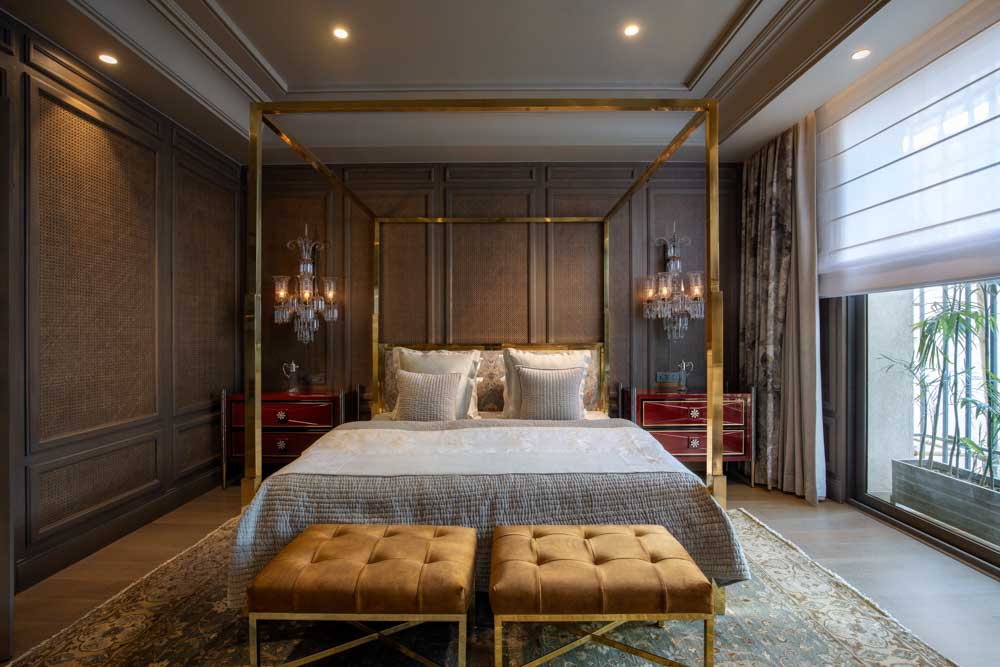 Modern bedroom seating with bun tufting & colour matching with interior decor - Beautiful Homes