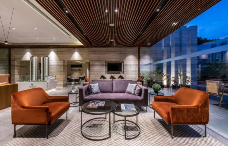 Nested glass center tables in this spacious living room - Beautiful Homes