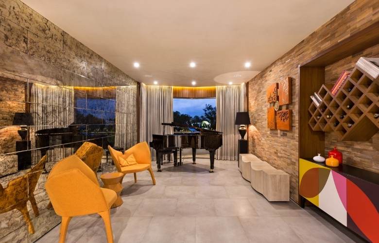 Unique yellow color chair that sets right with the extra ordinary room décor - Beautiful Homes