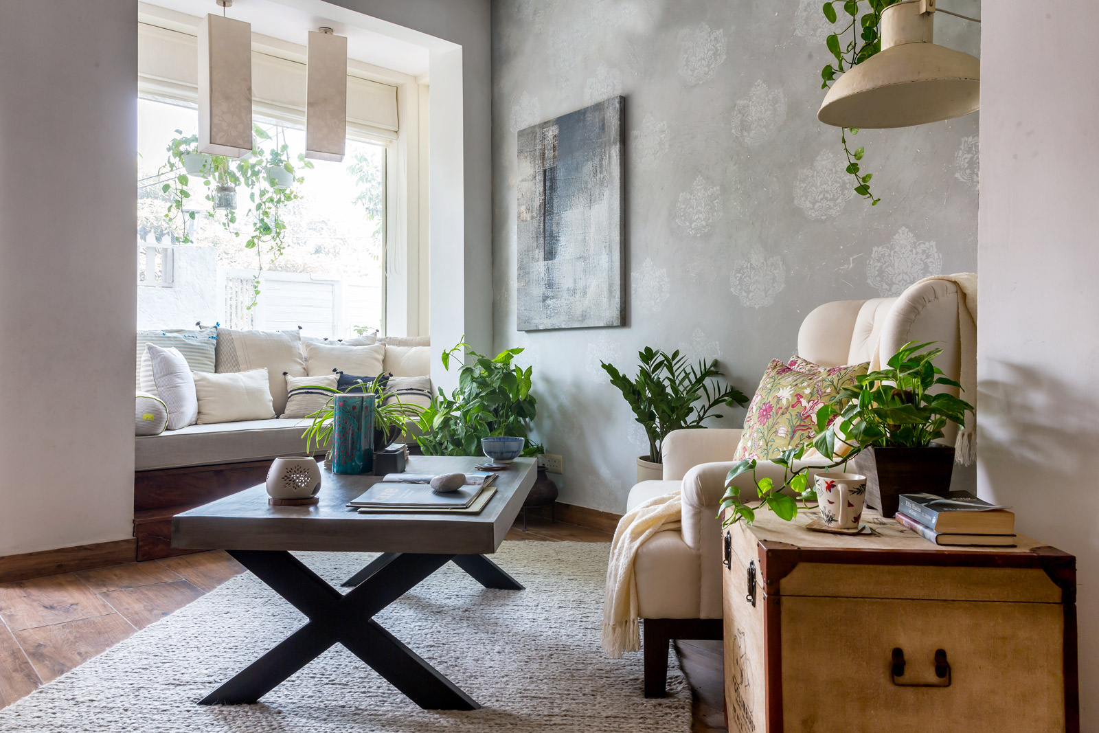 Living Room Design Ideas With Textured Concrete Grey Colour on Walls, Hanging Lights & Wooden Floor -  Beautiful Homes
