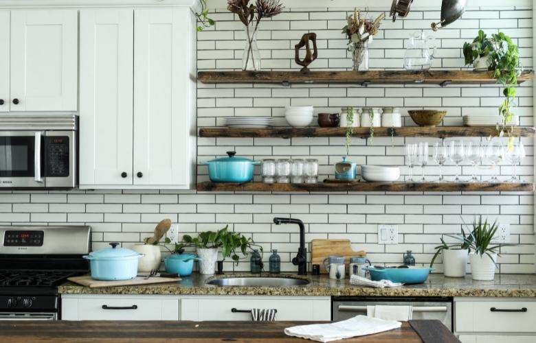 Small kitchen interior design with open shelves & brick pattern backsplash - Beautiful Homes