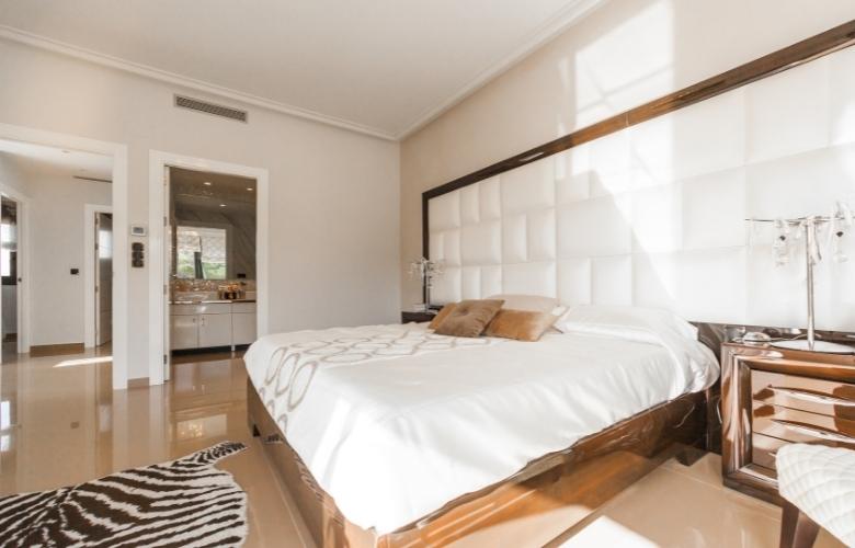 Fabric wall paneling in the bedroom - Beautiful Homes