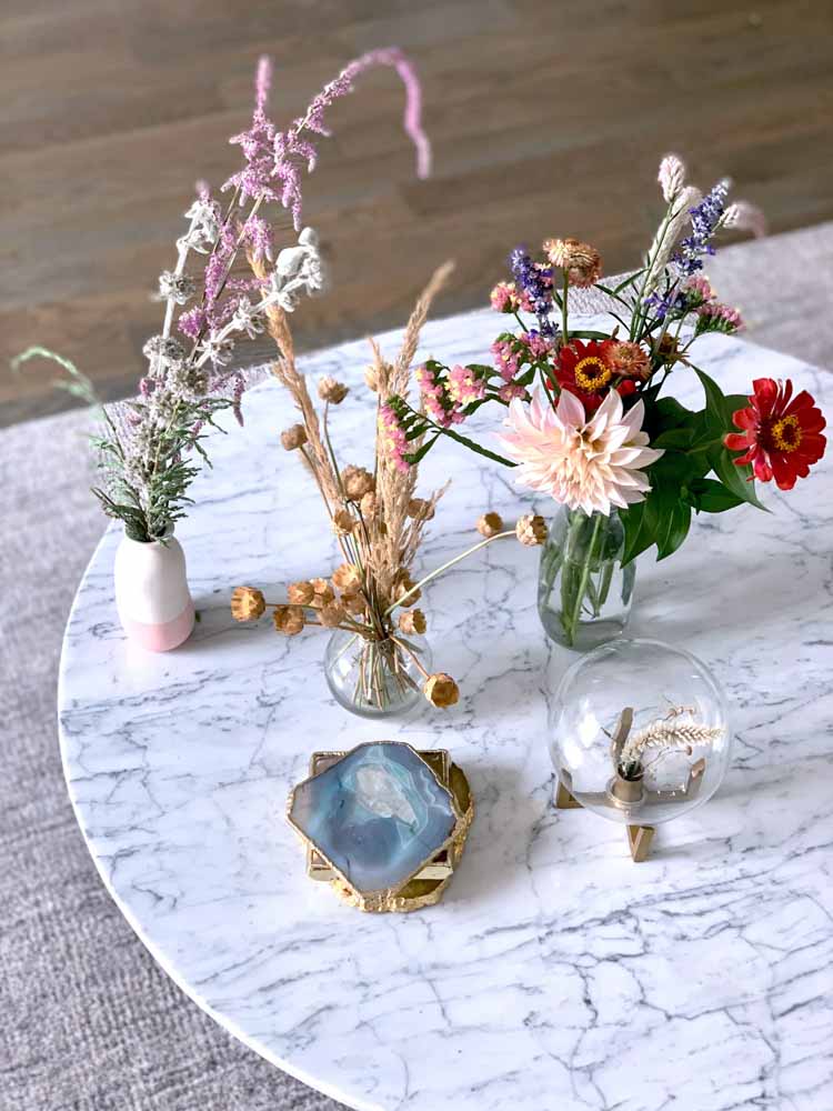 Use marble for your tabletop or coffee table for a chic living room decor - Beautiful Homes