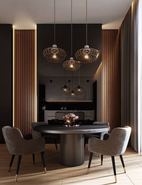 Bold dining room design with a round dining table & armchairs - Beautiful Homes