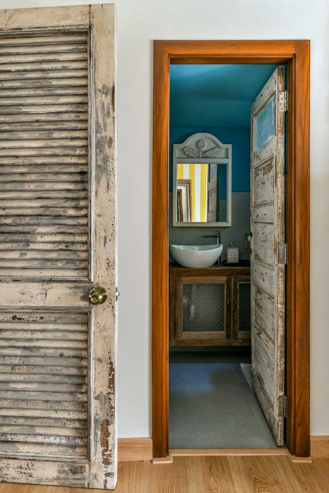 Neutral palatte used in the restroom for floors & walls for spaciousness - Beautiful Homes