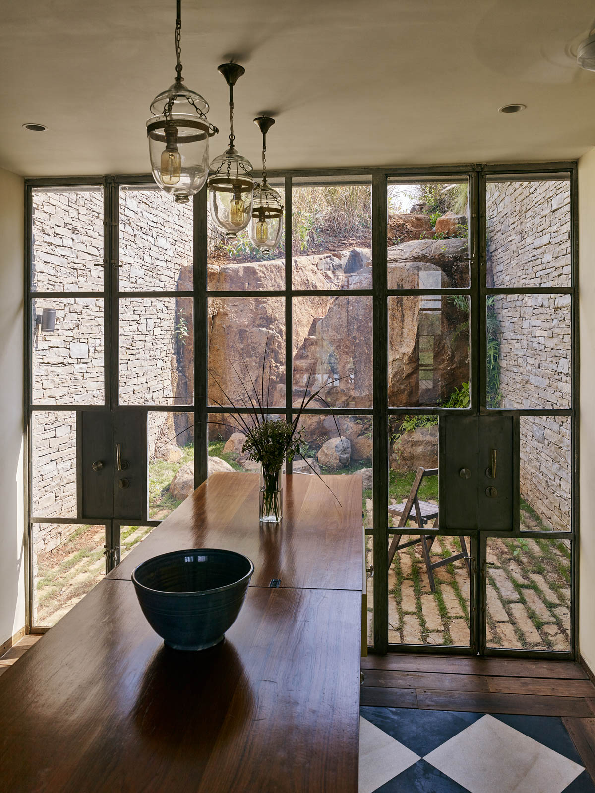 A Kitchen Opening to Courtard at Karjat House - Beautiful Homes
