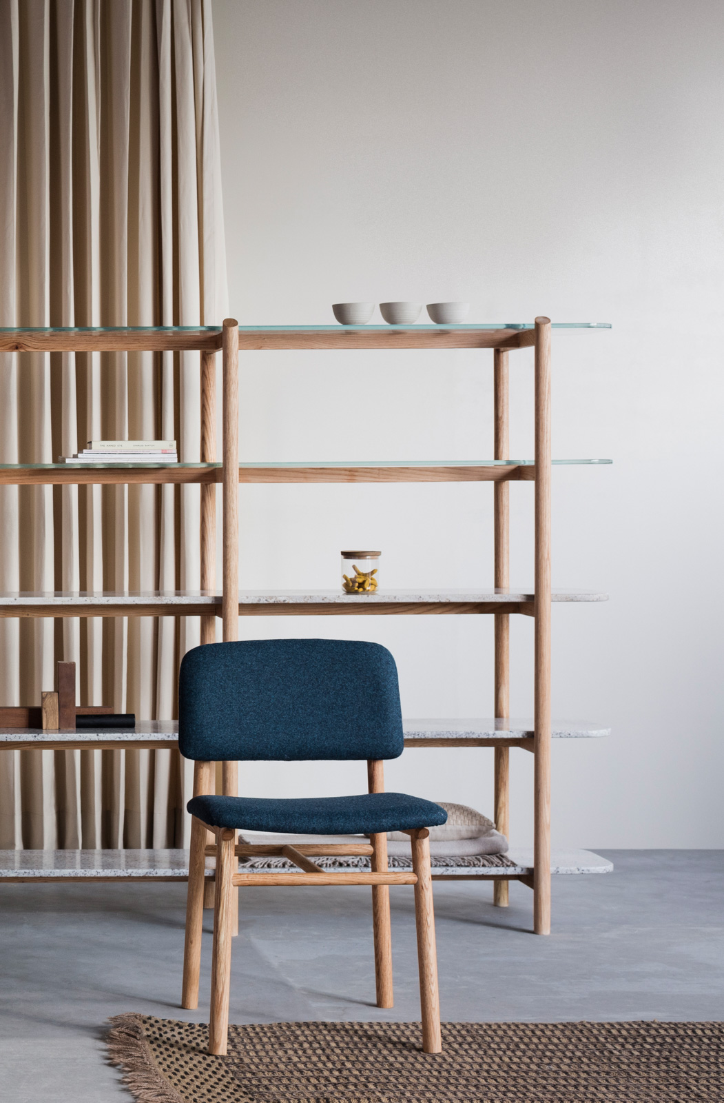 This ‘Myrica’ free-standing shelf, by Anne Claire Hostequin from France, with a beech wood frame, has its upper two shelves in glass and the lower three in marble, thus dissolving the typical visual impact that shelves tend to have in a household space.