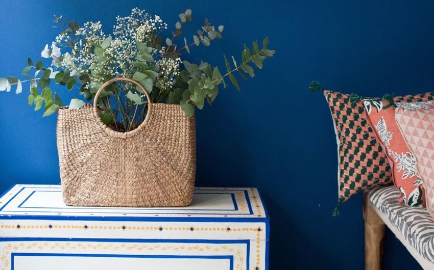 A cosy corner of Jamini Design store decorated with accessories - Beautiful Homes