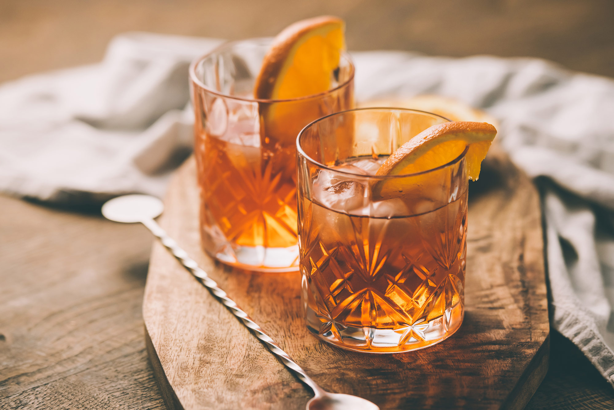 A wooden platter used as a tray for cocktails - Beautiful Homes