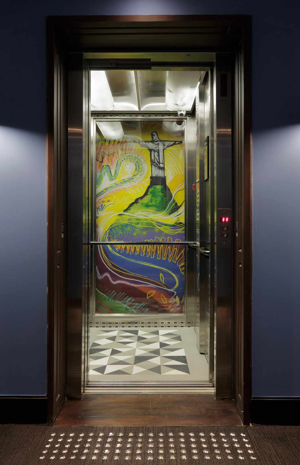 The lift shaft features hand-paintings by Rio based graffiti artist Marcelo Ment - Beautiful Homes