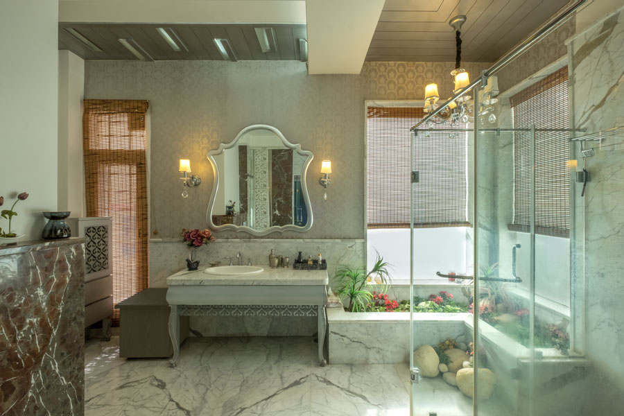 Vintage bathroom lights, Victorian-style light holders on the side of sink mirror, marble floor