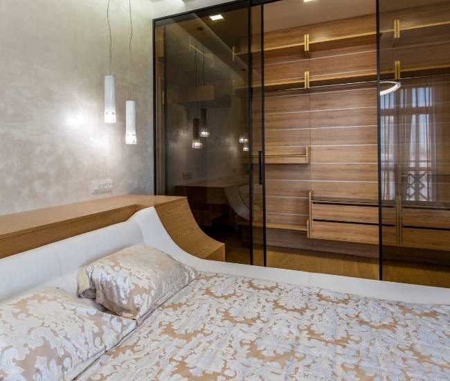 Wardrobe designs for small bedroom with transparent glass - Beautiful Homes