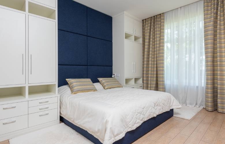 Wardrobes for bedroom design with long curtains - Beautiful Homes