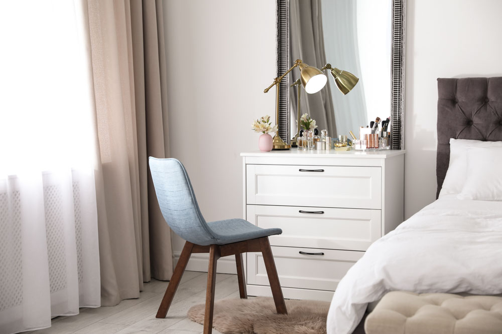 Use your bedside table as a dressing table matching with bedroom décor - Beautiful Homes