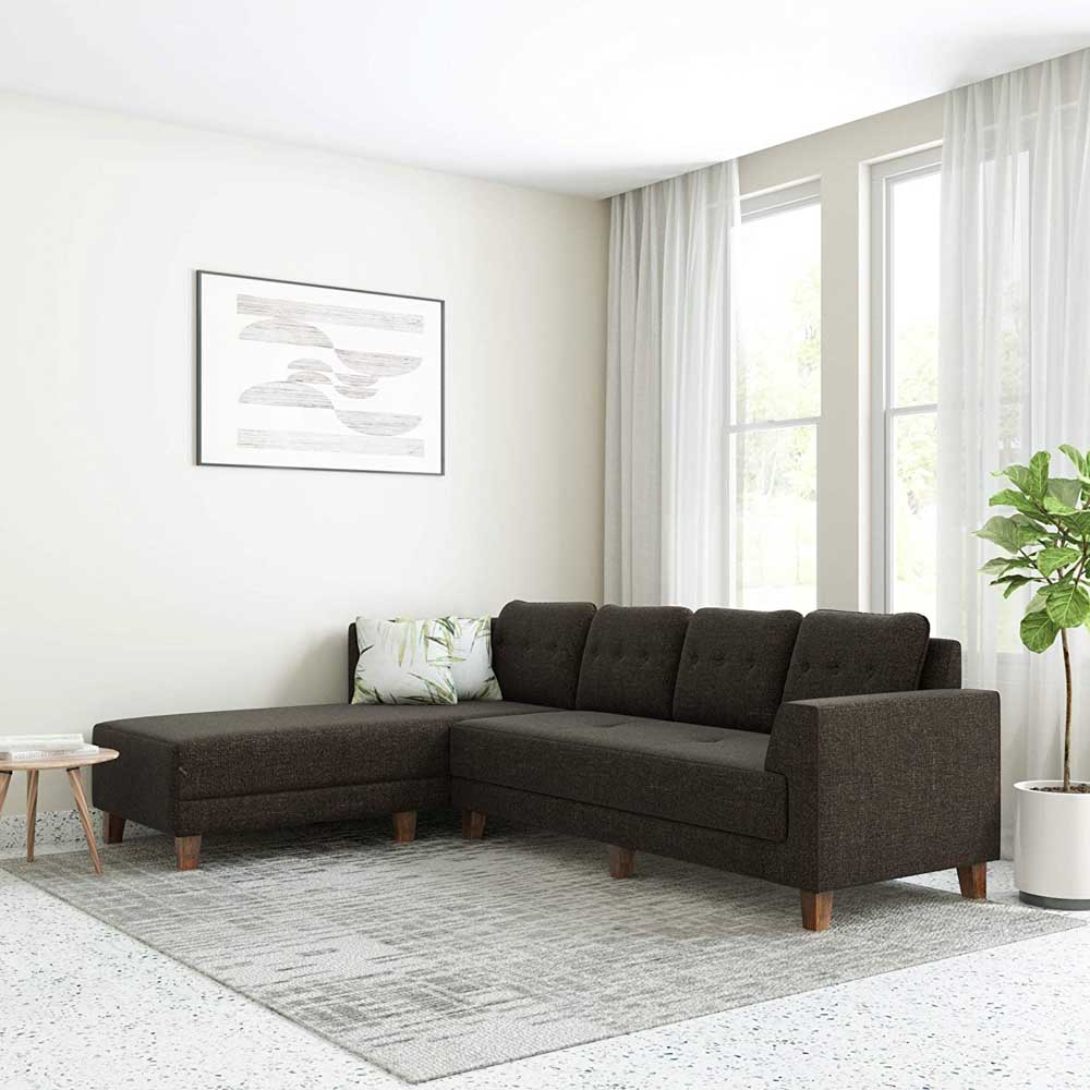 Convertible L-shaped sofa bed design in white & grey shades for the living room interior design - Beautiful Homes