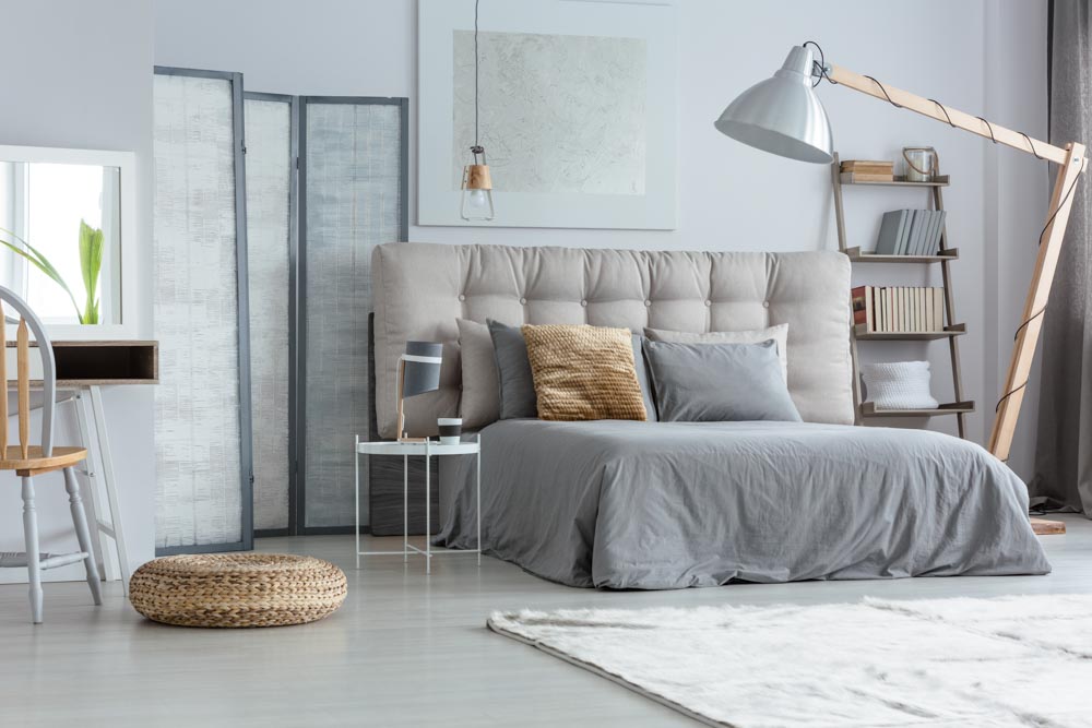 Contemporary bedroom design with an oversized floor lamp that goes with the bedroom decor - Beautiful Homes