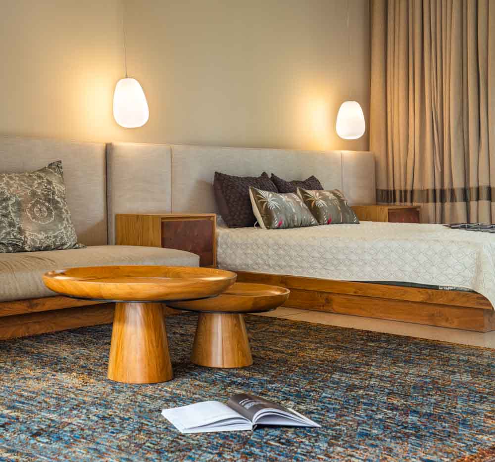 Accent center tables & large area rug for your luxury bedroom interiors - Beautiful Homes