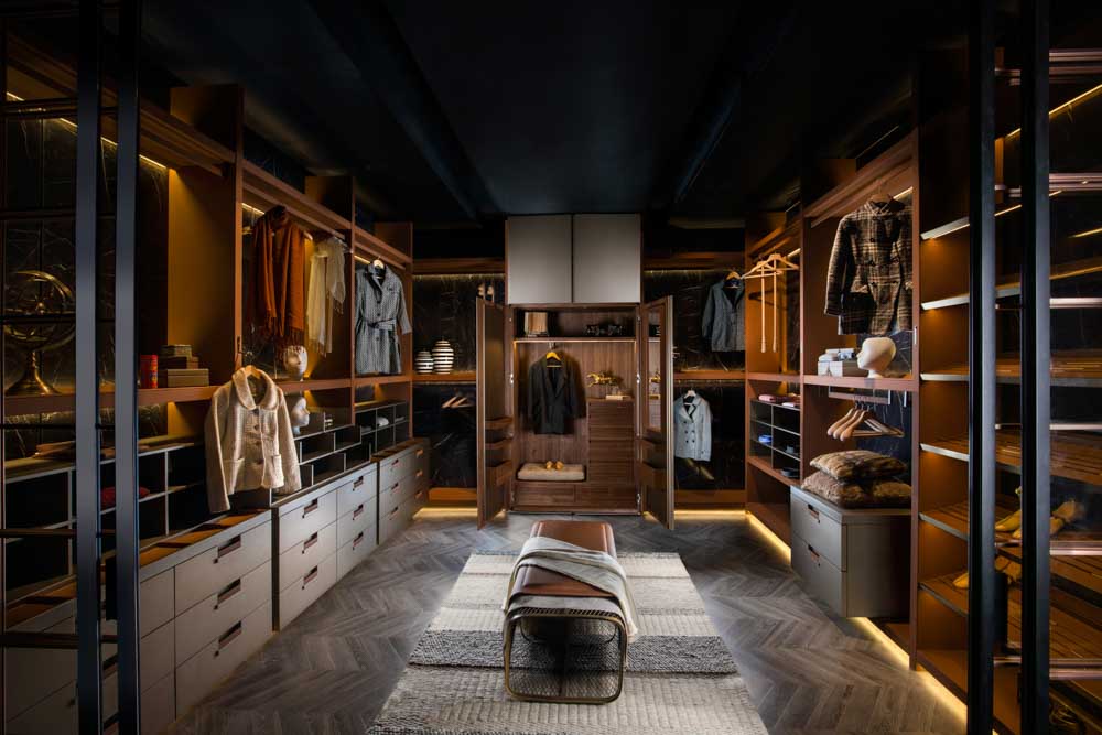 A spare room converted into a beautiful multi-functional walk-in wardrobe design - Beautiful Homes