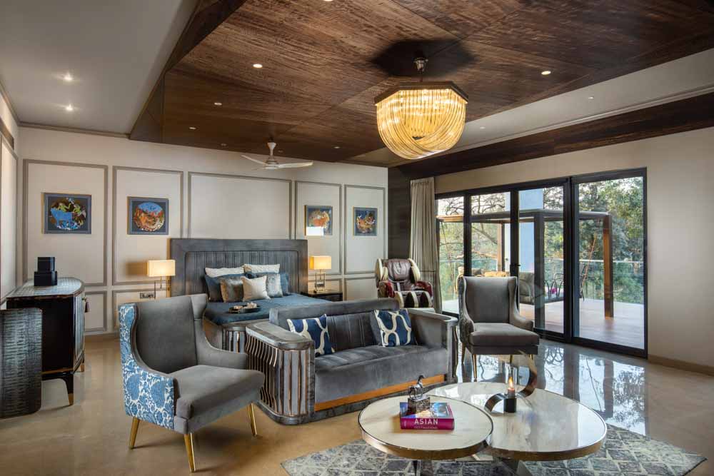 3d accent wooden bedroom ceiling design with a modern chandelier - Beautiful Homes