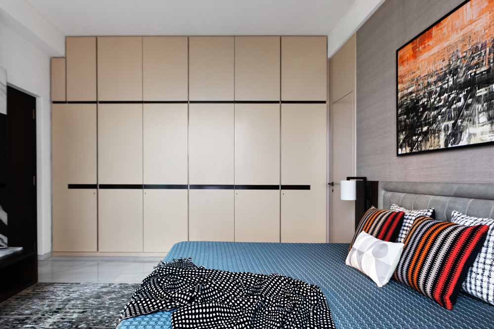 Cupboard design in nude & black shades for small bedroom  - Beautiful Homes