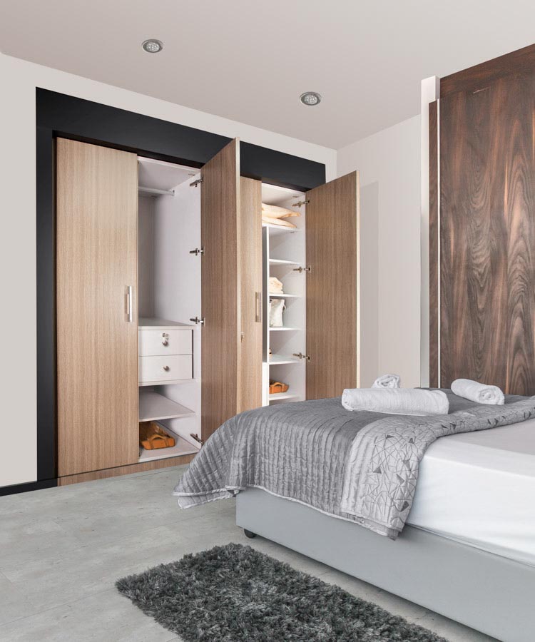 Light wood colour fitted closets for bedroom - Beautiful Homes