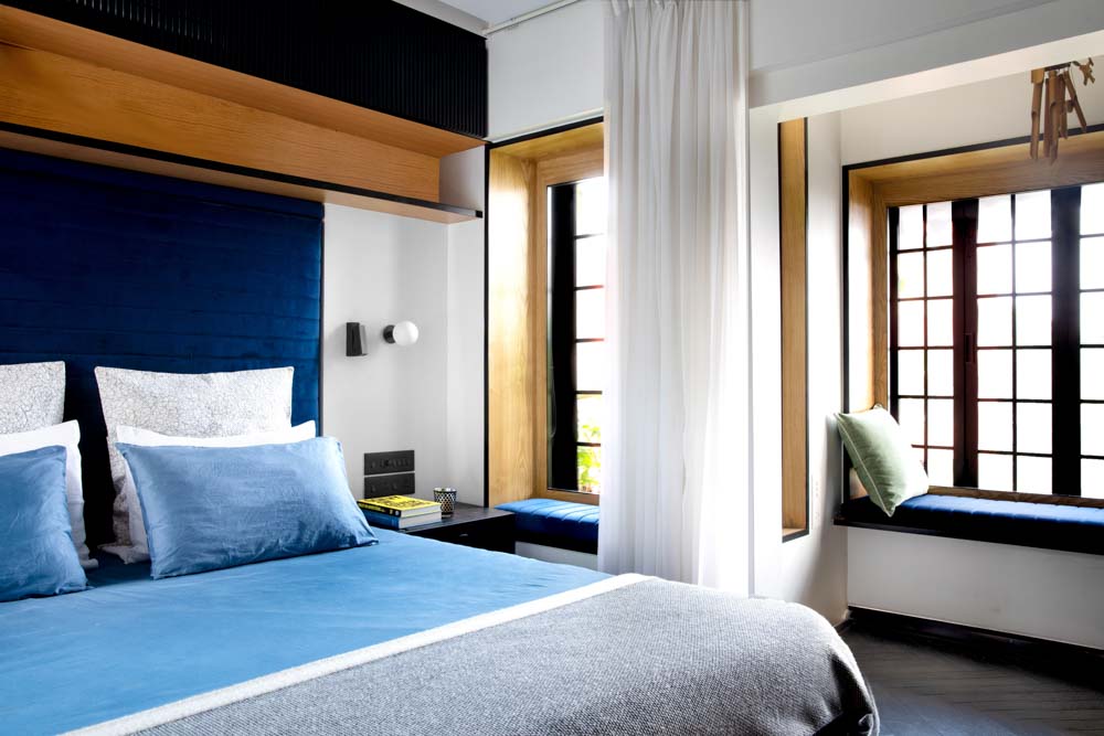 Bedroom interiors wall colour design with shades of blue - Beautiful Homes