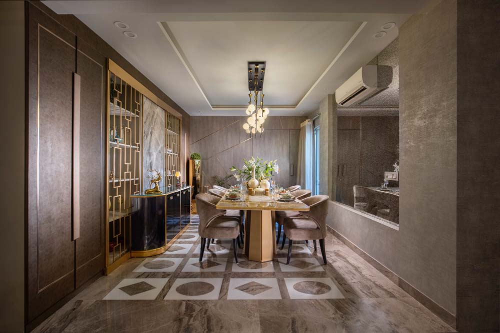 Spacious dining room design with marble flooring & mirror as a home décor element - Beautiful Homes