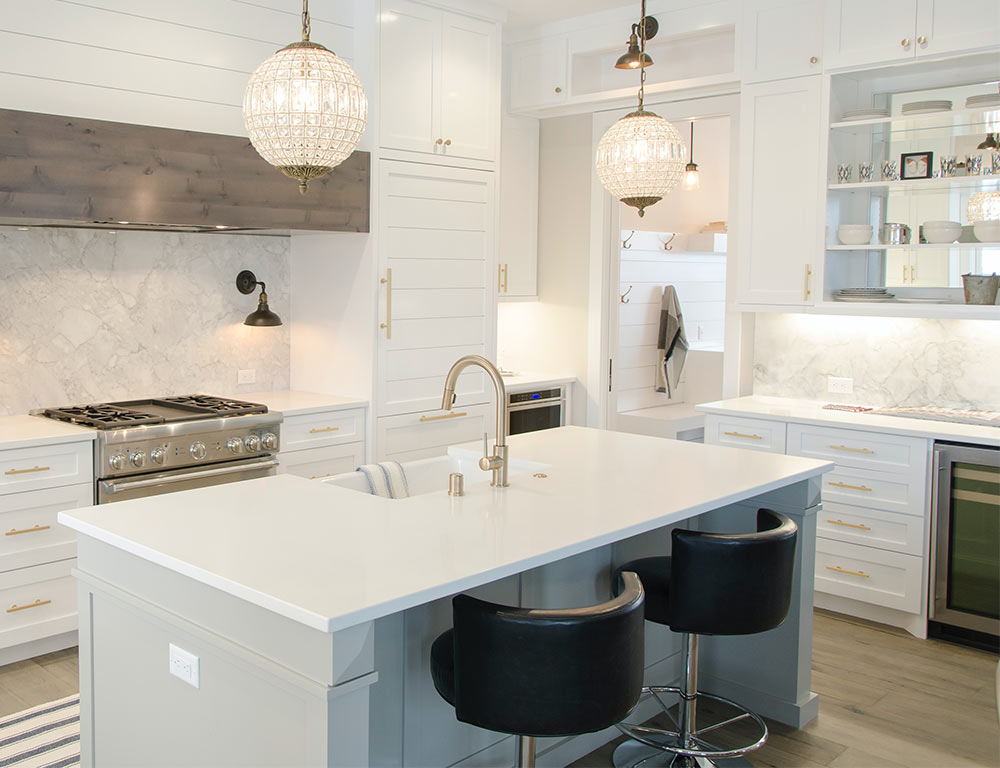 Glass kitchen slab design with round hanging lights - Beautiful Homes