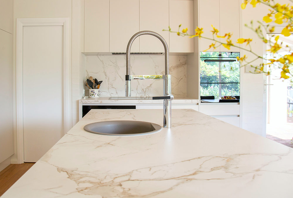 Quartz countertops with a round sink - Beautiful Homes