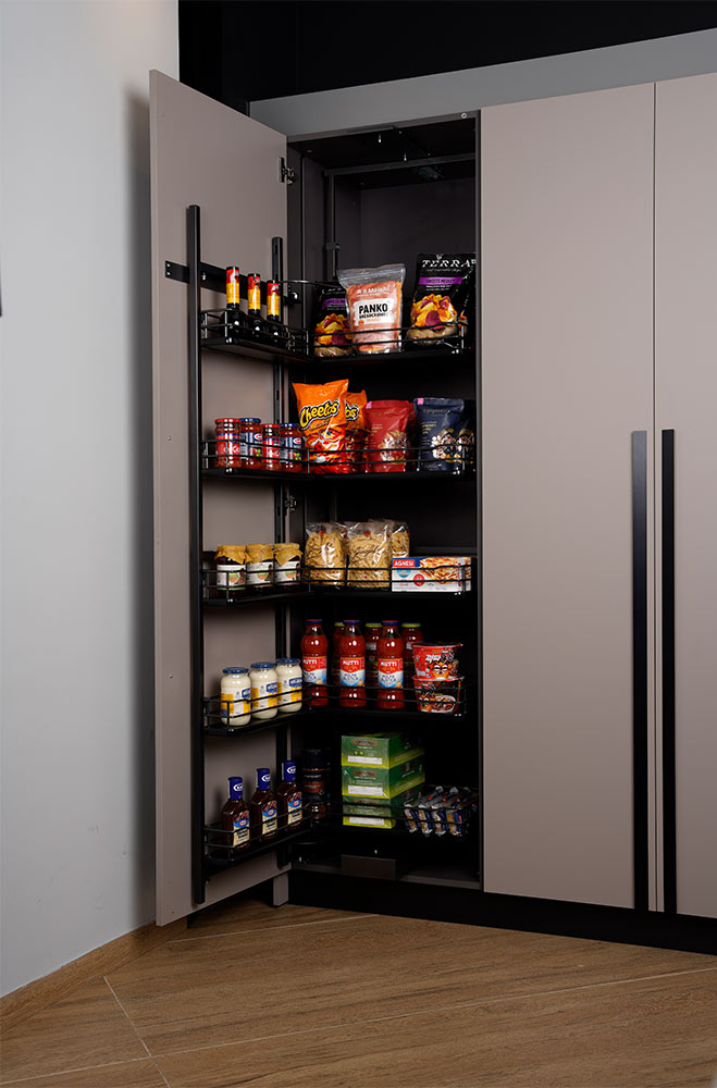 Behind door storage in a tall kitchen unit - Beautiful Homes