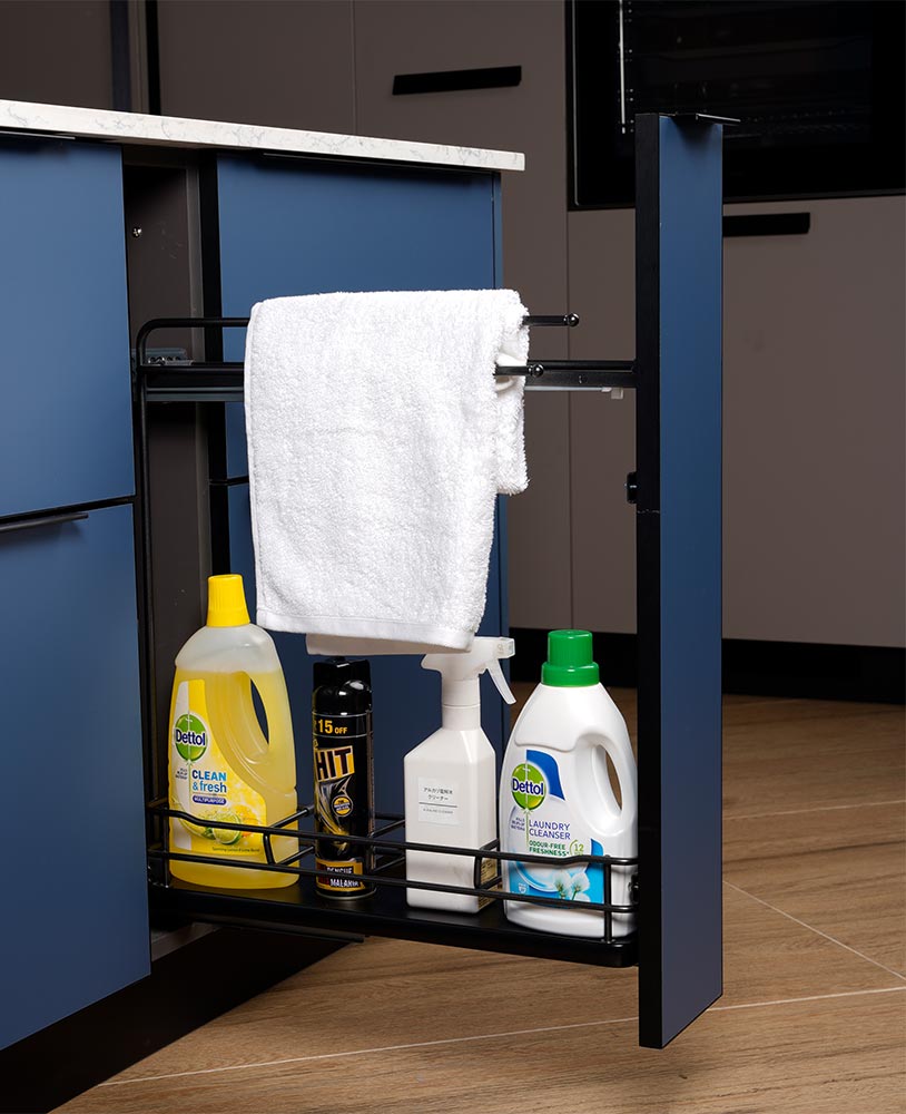 Kitchen cleaning items in a narrow drawer - Beautiful Homes