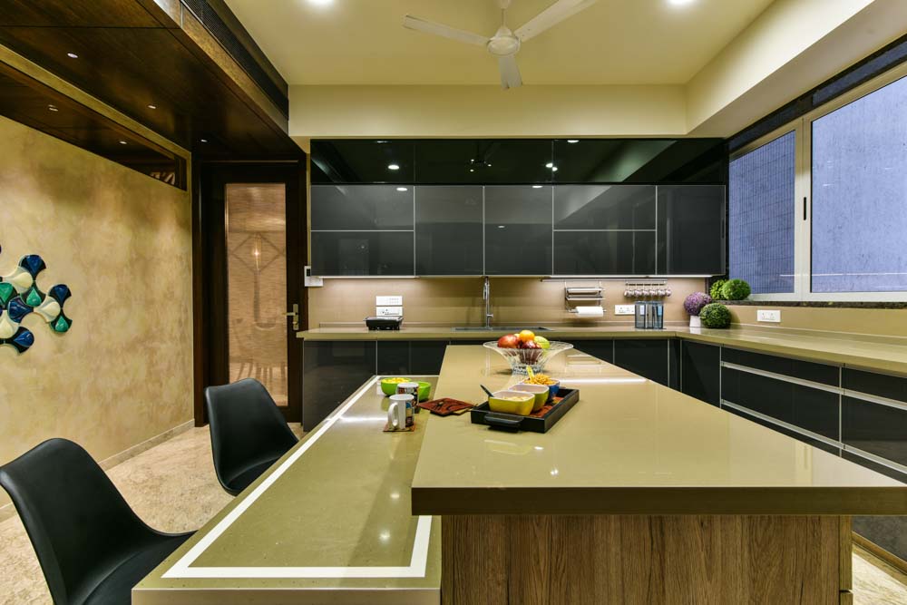 Luminous kitchen lighting & modern kitchen interiors with glass shutter cabinets - Beautiful Homes