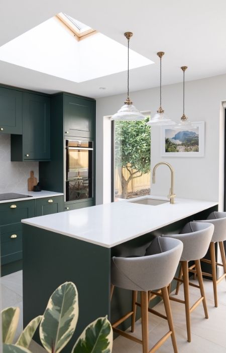 White & neutral tones with green for your modular kitchen colour combination - Beautiful Homes