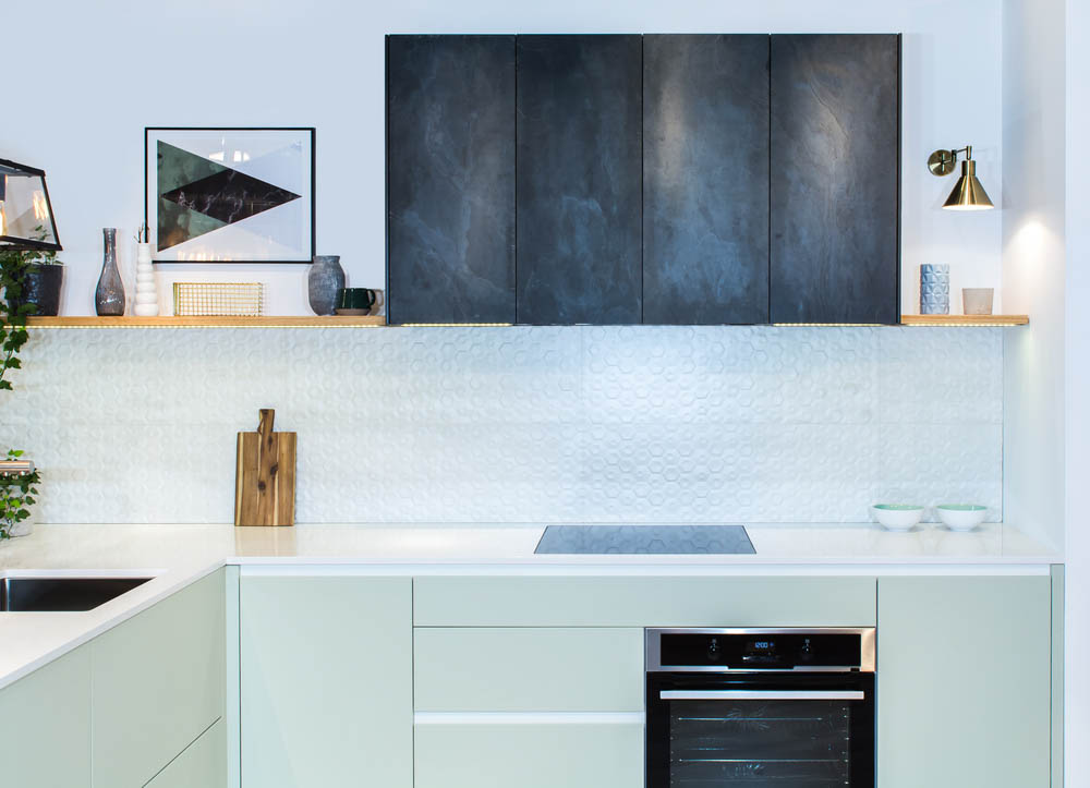 Kitchen interiors with mint green & white colour palette & black kitchen cabinets - Beautiful Homes