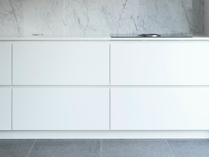 Parallel kitchen interior design with hand less cabinets & built-in sink - Beautiful Homes