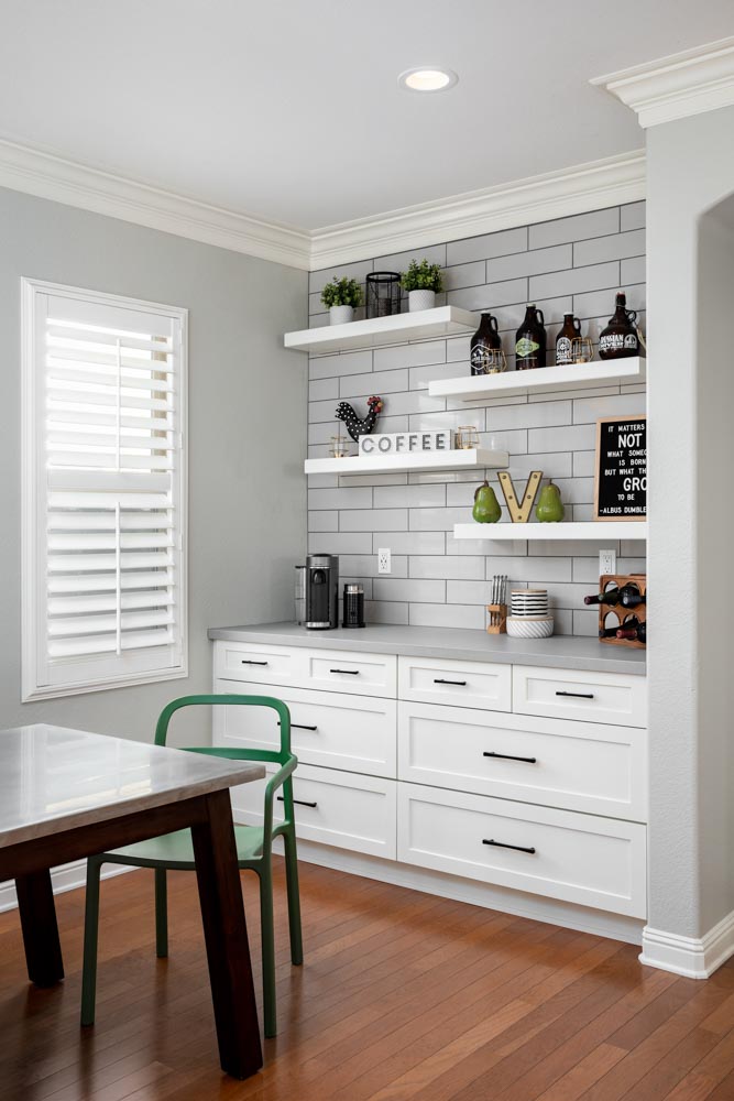 A small coffee or tea station with small table & vibrant chairs for breakfast nook - Beautiful Homes