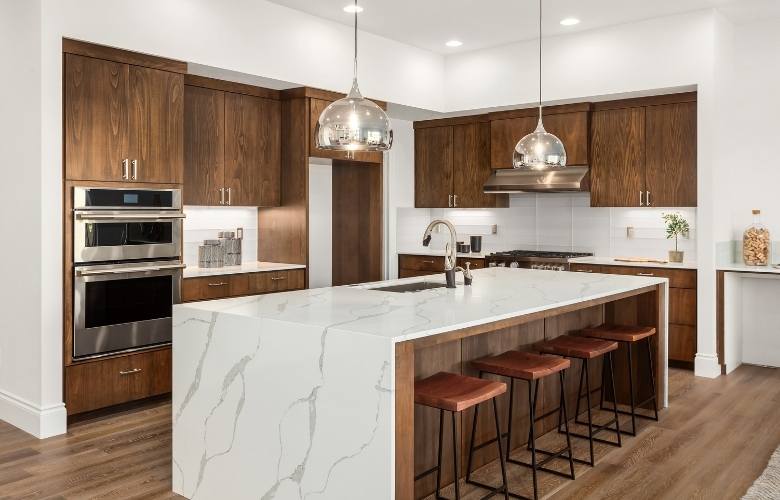 Brown wooden & white kitchen colour combination for large kitchen - Beautiful Homes
