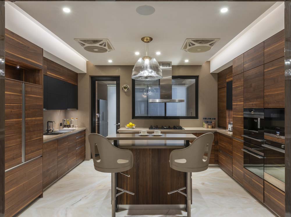 Large u shaped modular kitchen design with compact multi-functional kitchen island - Beautiful Homes