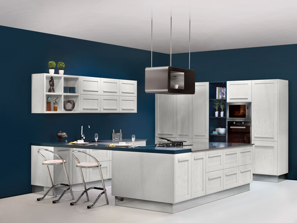 Spacious semi-open kitchen layout with deep blue & white u shaped modular kitchen design - Beautiful Homes