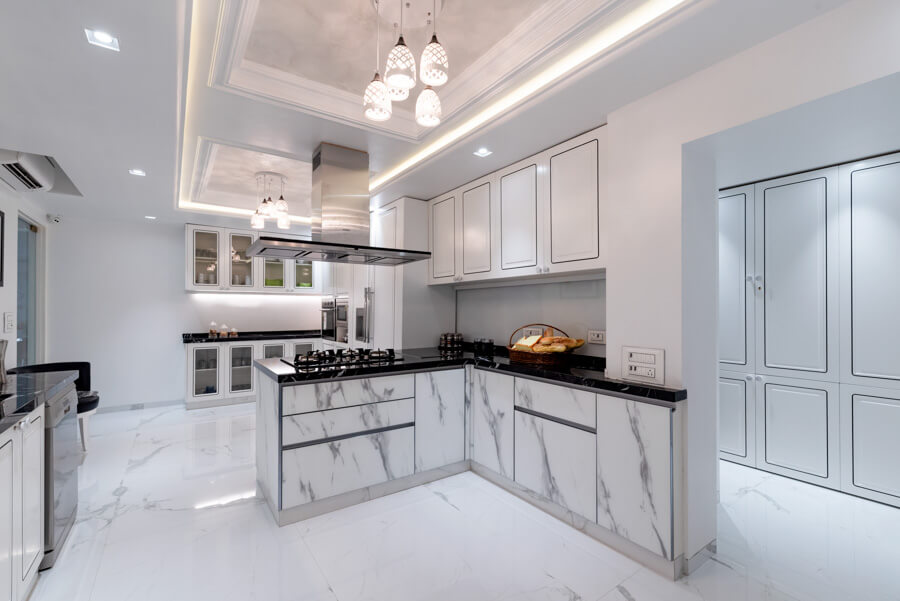 White Modular Kitchen Design With Marble Flooring and Kitchen Appliances - Beautiful Homes