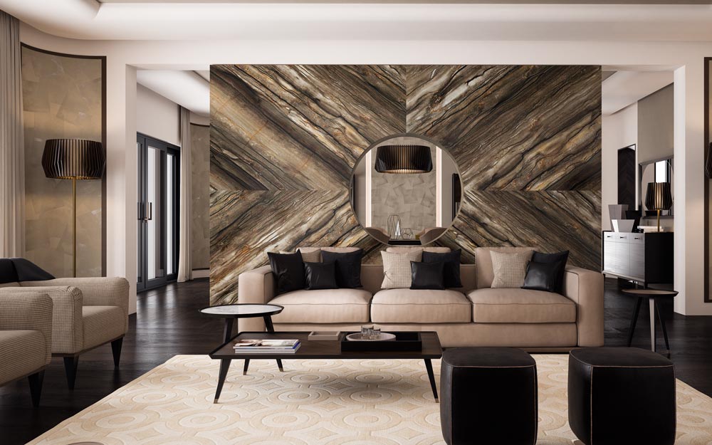 Drawing room interior design textured stone wall dividing the space from the open kitchen - Beautiful Homes