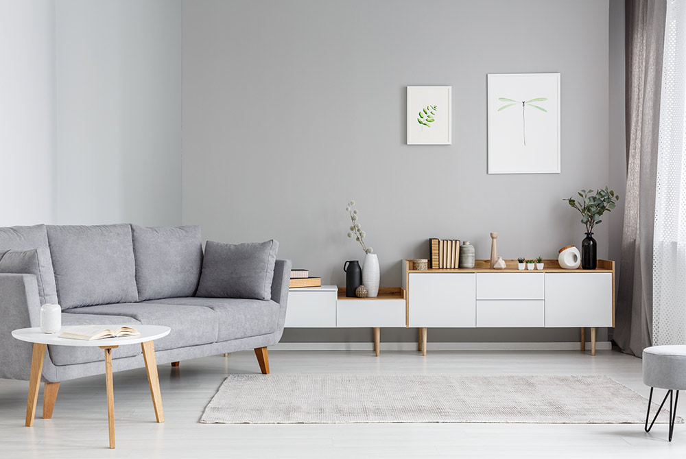 White storage unit ideas with white rug for your minimal living room décor - Beautiful Homes