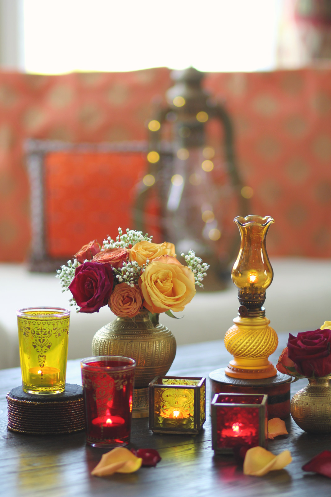Diwali Decoration Ideas For Living Room With Round up Coloured Glass Votives & C&le Holders in Red & Yellow Colour - Beautiful Homes