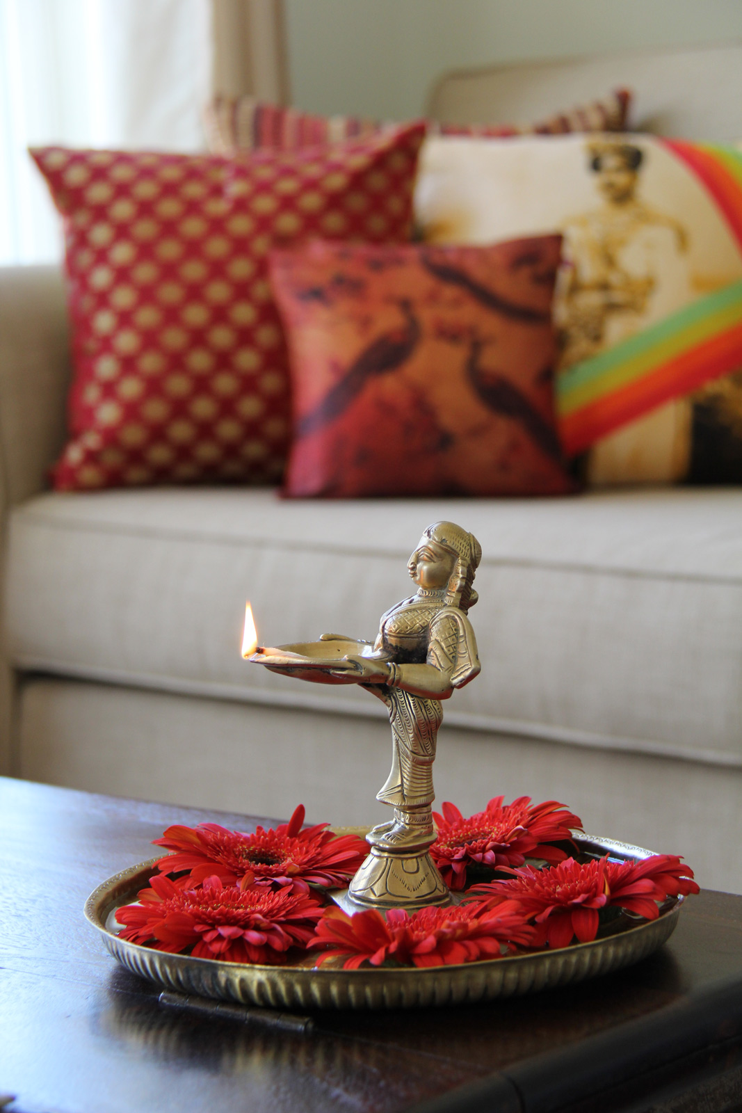 Diwali Decoration Ideas For Living Room With Float Flaming Red Gerberas in a Brass Thali - Beautiful Homes