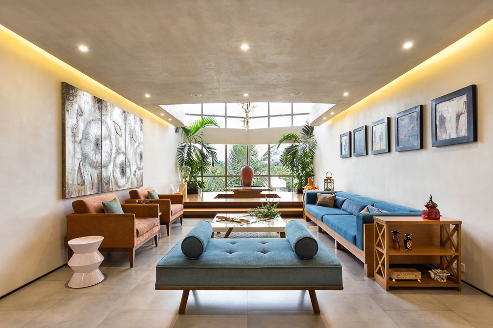 False Ceiling Design for a Bold Statement With Raw Concrete Walls & Floor - Beautiful Homes